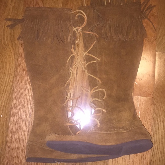 Fringed Knee length lace up boots by Minnetonka - Picture 1 of 3